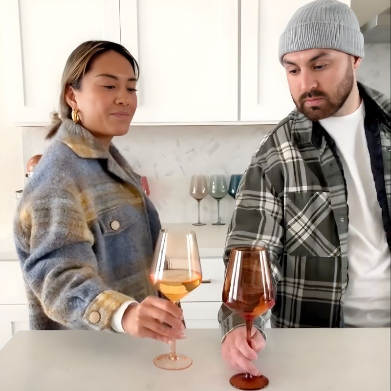 Couple enjoying Saludi glasses