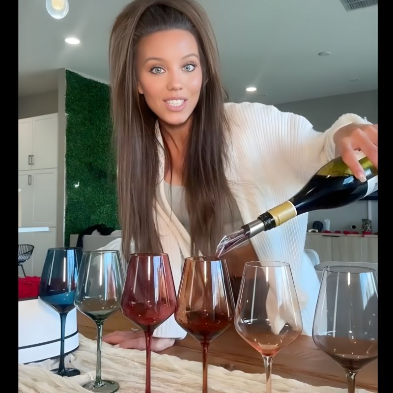 Pouring wine into Saludi glasses