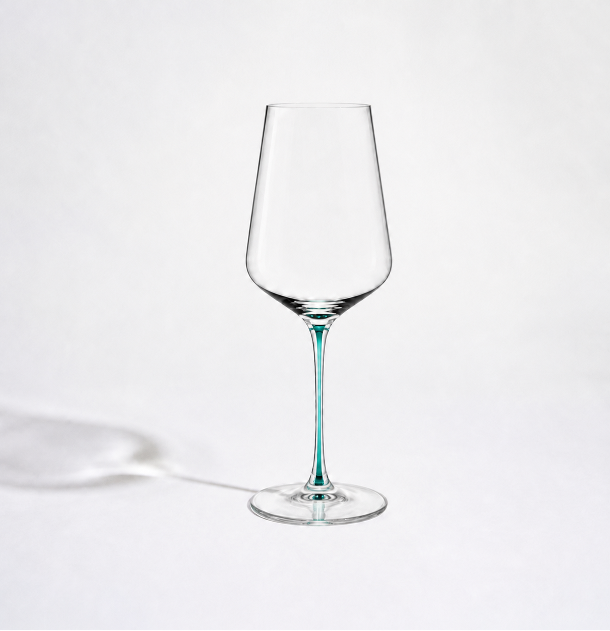 Close-up of the colored glass ribbon inside a clear White Wine glass stem